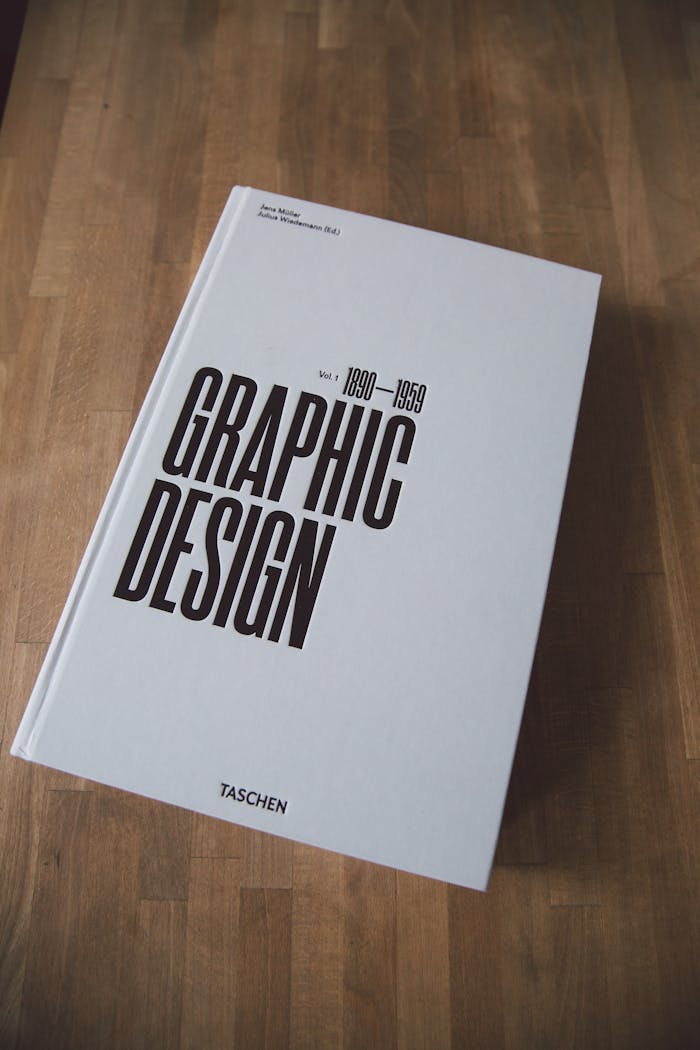 Services Artistic cover of a graphic design book highlighting 1890-1959.